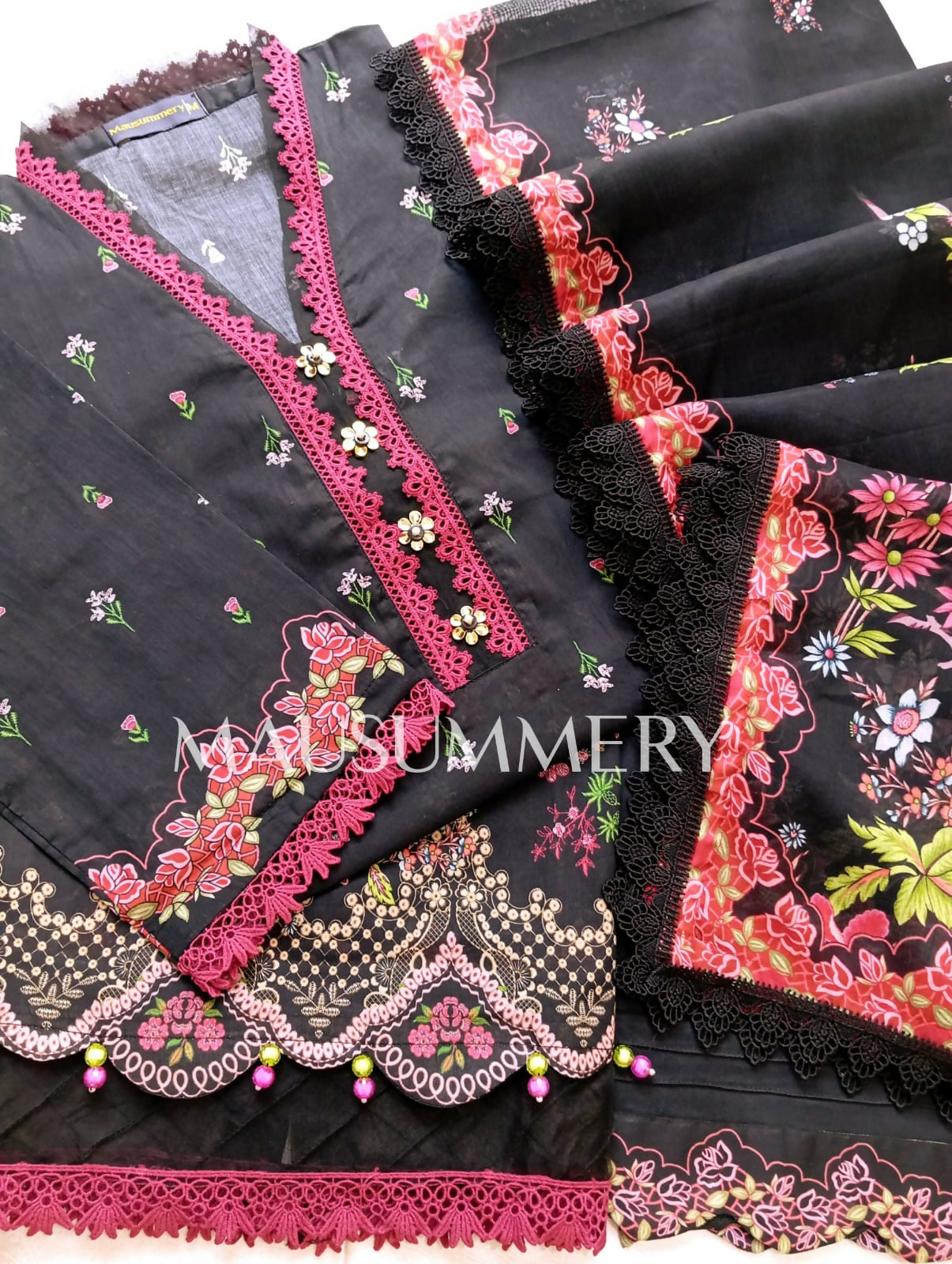 Black and pink unstitched suit